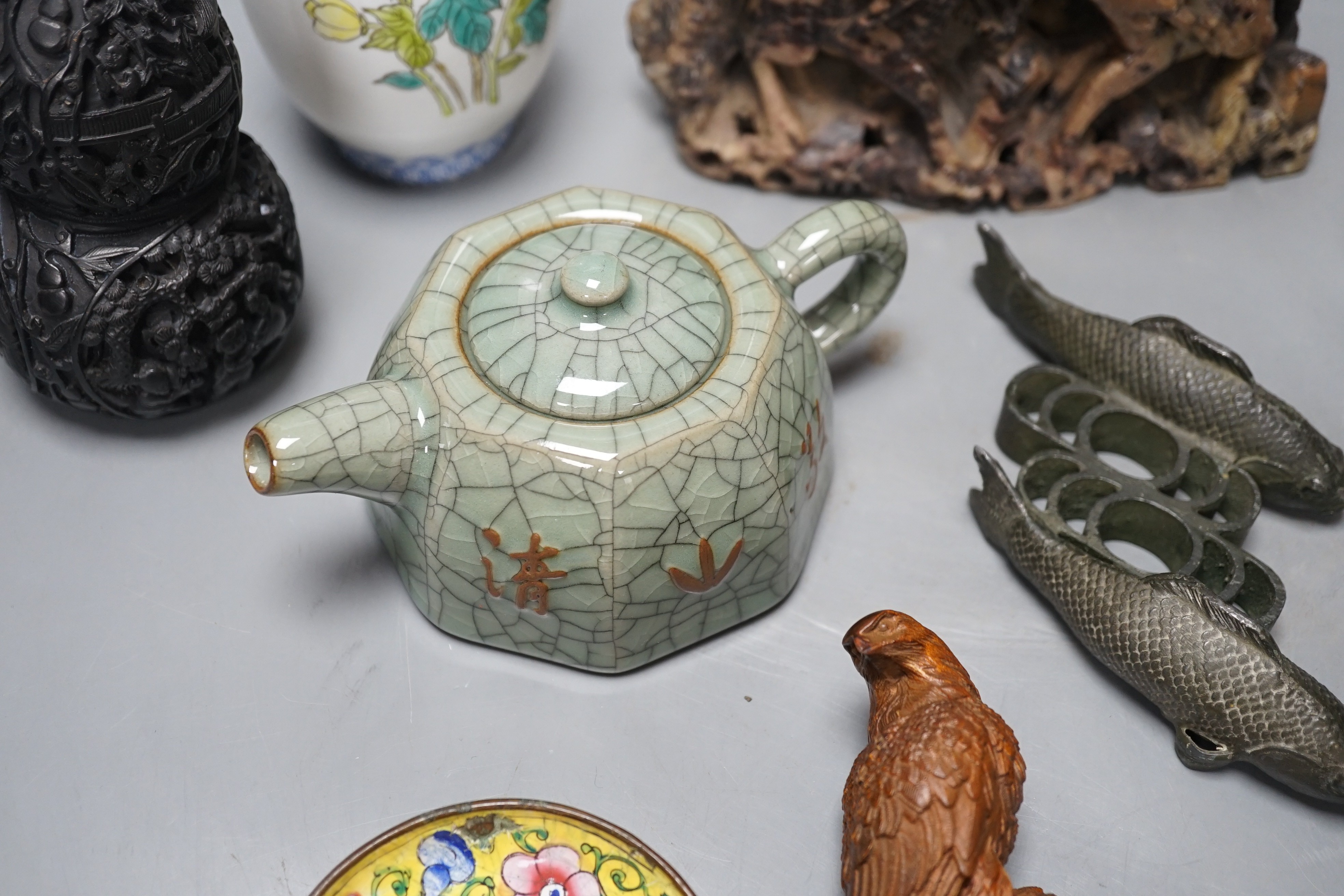 A group of Chinese and Japanese ceramics, carvings etc. 20cm